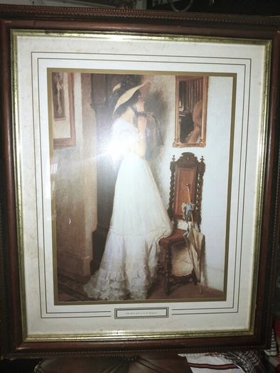 The new hat-picture in wooden frame