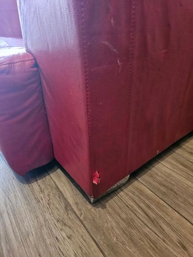 Red Leather two seater couch