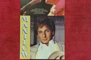 Two LPs and a single. Sarstedt, Manilow, Last Emperor.