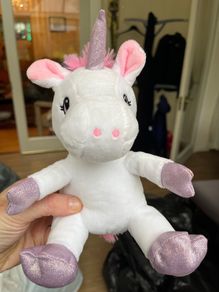 Cuddly white and pink unicorn
