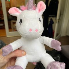 Cuddly white and pink unicorn