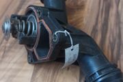 BMW thermostat with housing