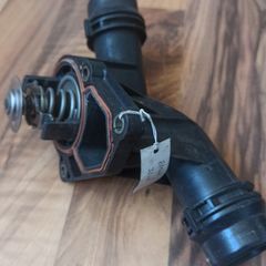 BMW thermostat with housing