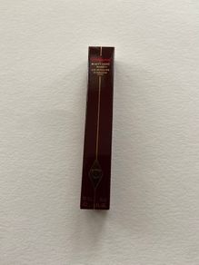 Charlotte tilbury beauty light wand highlighter in shade spotlight