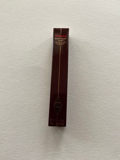 Charlotte tilbury beauty light wand highlighter in shade spotlight