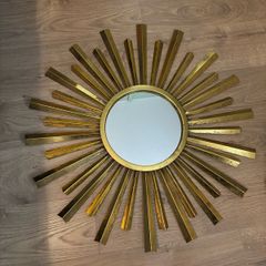 Gold wall mirror