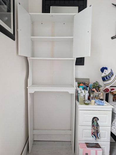 Tall cabinet, can be unscrewed for transport.