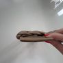 H&M stone colour plait affect slides Image 3