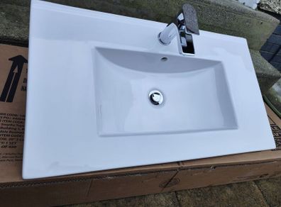 Sink with tap