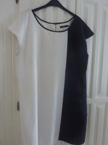 A Classic Black & White Sleeveless Dress