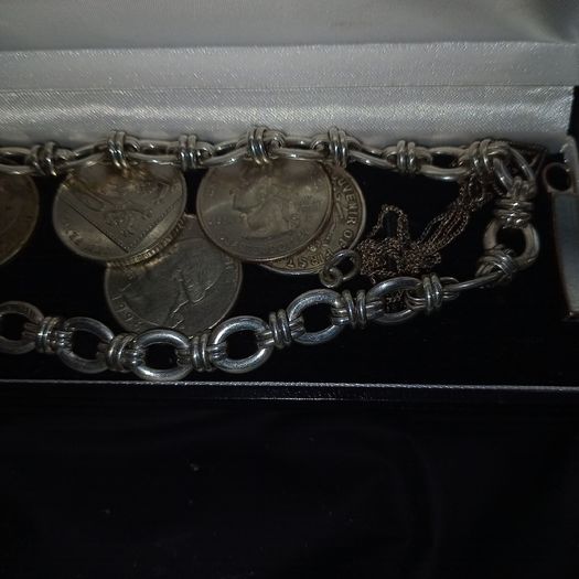 Silver Link Chain and some coins.