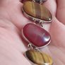 A vintage bracelet featuring natural stone accents. Image 3