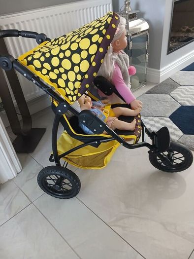 dolls and  buggy