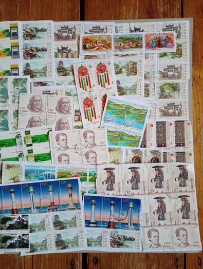 Stamps - A collection of 329 colourful Chinese stamps.
