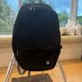 Black back pack, 3 pockets and a side net Image 2