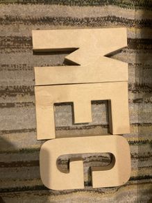 3 large sturdy cardboard cutout shapes G E and M