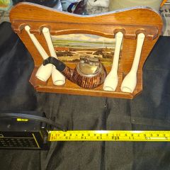4 Clay Pipes a Pipe Lighter and Holder for sale as a lot Postage Available,