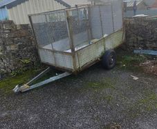 Large checker plate trailer with mesh sides