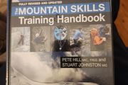 The Mountain Skills Training Handbook.  By Pete Hill &amp; Stuart Johnston.  Hardback In Good Condition.