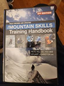 The Mountain Skills Training Handbook.  By Pete Hill & Stuart Johnston.  Hardback In Good Condition.