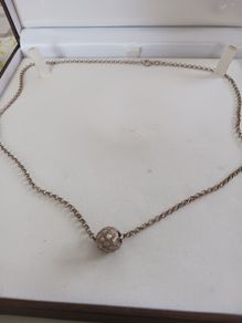 silver chain and pendant