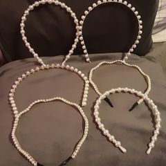 fancy head band, possibly holy communion