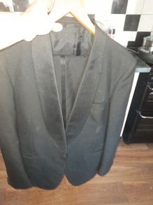 Two Black Debs Suits Selling Cheap as I don't know Sizes Price is for 2, both suits are Black, the light on camera may look different, Postage Available or Collection