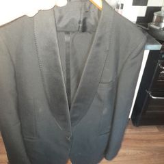 Two Black Debs Suits Selling Cheap as I don't know Sizes Price is for 2, both suits are Black, the light on camera may look different, Postage Available or Collection