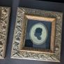 Pair of vintage silhouette portraits in ornate gold frames Image 3