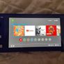 Nintendo Switch Lite and SanDisk 64GB card Image 2