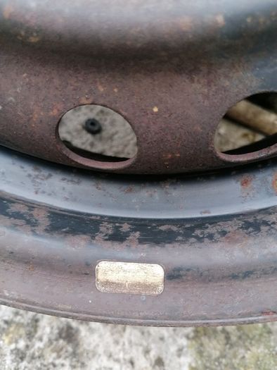 2 x steel rims 15", 4 stud, about 114mm ish from hole centre to the opposite home centre... Possibly fit a nissan etc