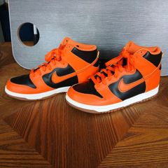 Orange and Black Nike hi tops