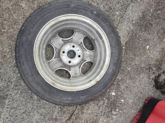 165/65r14 opel Corsa rim good for  spare wheel ,needs a paint. the tire is in good condition 80%