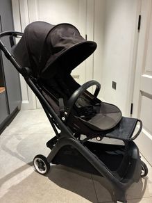 Bugaboo Butterfly with rain cover, standing board