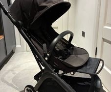 Bugaboo Butterfly with rain cover, standing board