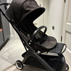 Bugaboo Butterfly with rain cover, standing board