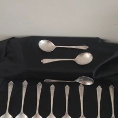 Collection of 11 Vintage Newbridge Silverware Celtic Dragon Design Spoons from Jurys Hotel