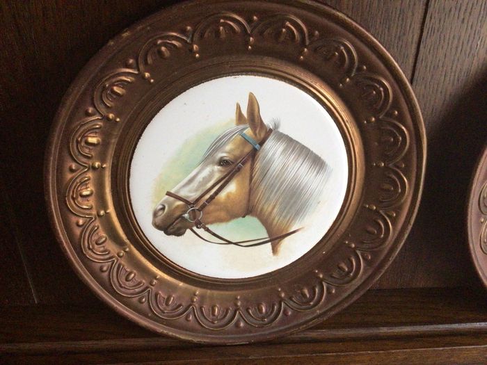 A pair of 10 inch copper wall hanging horses head plaques with hangers