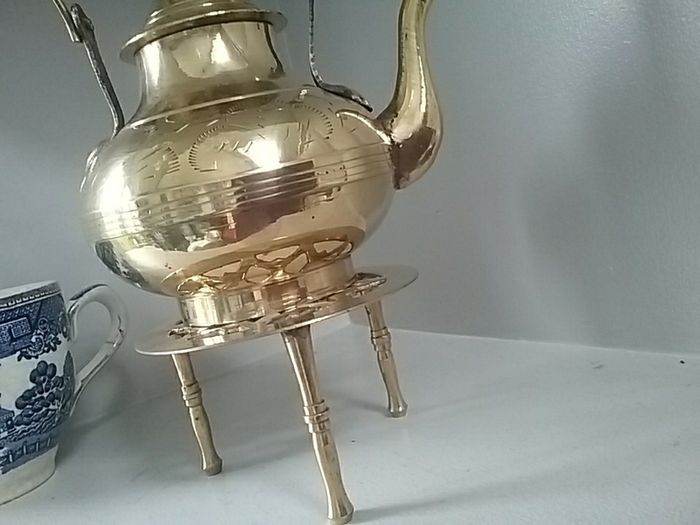Brass Teapot on a Trivet