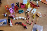 Wooden toys for dolls house nursery