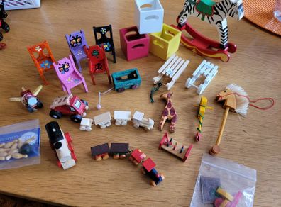 Wooden toys for dolls house nursery
