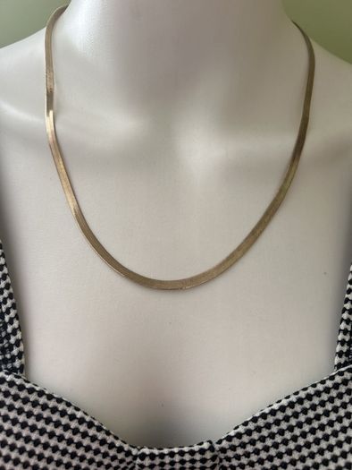 Gold tone snake chain necklace