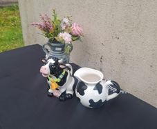 By post only 2 ceramic cow pitchers