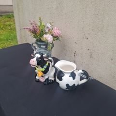 By post only 2 ceramic cow pitchers
