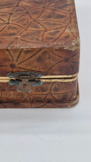 Cutlery set in a box .