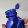 393 - Set of Two Beautiful Vintage Cobalt Blue Glass Decorative Collectible Milk of Magnesia Bottles Image 2