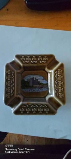 irish made porcelain wade ashtray,,prefect condition see the pictures for condition,buyer collects or pays postage thank you ,bunratty Castle picture insert ,