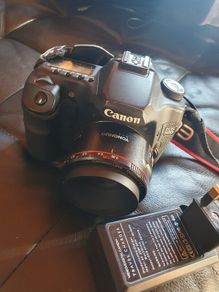 canon 50d charger  swap