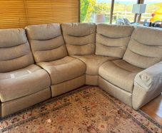Electric reclining corner sofa