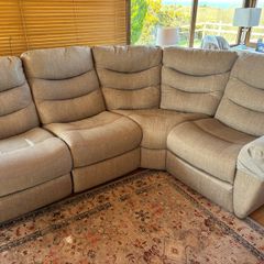 Electric reclining corner sofa